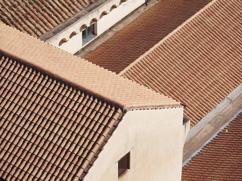light brown roofing of three houses